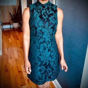 Mini floral black mesh dress with lining.